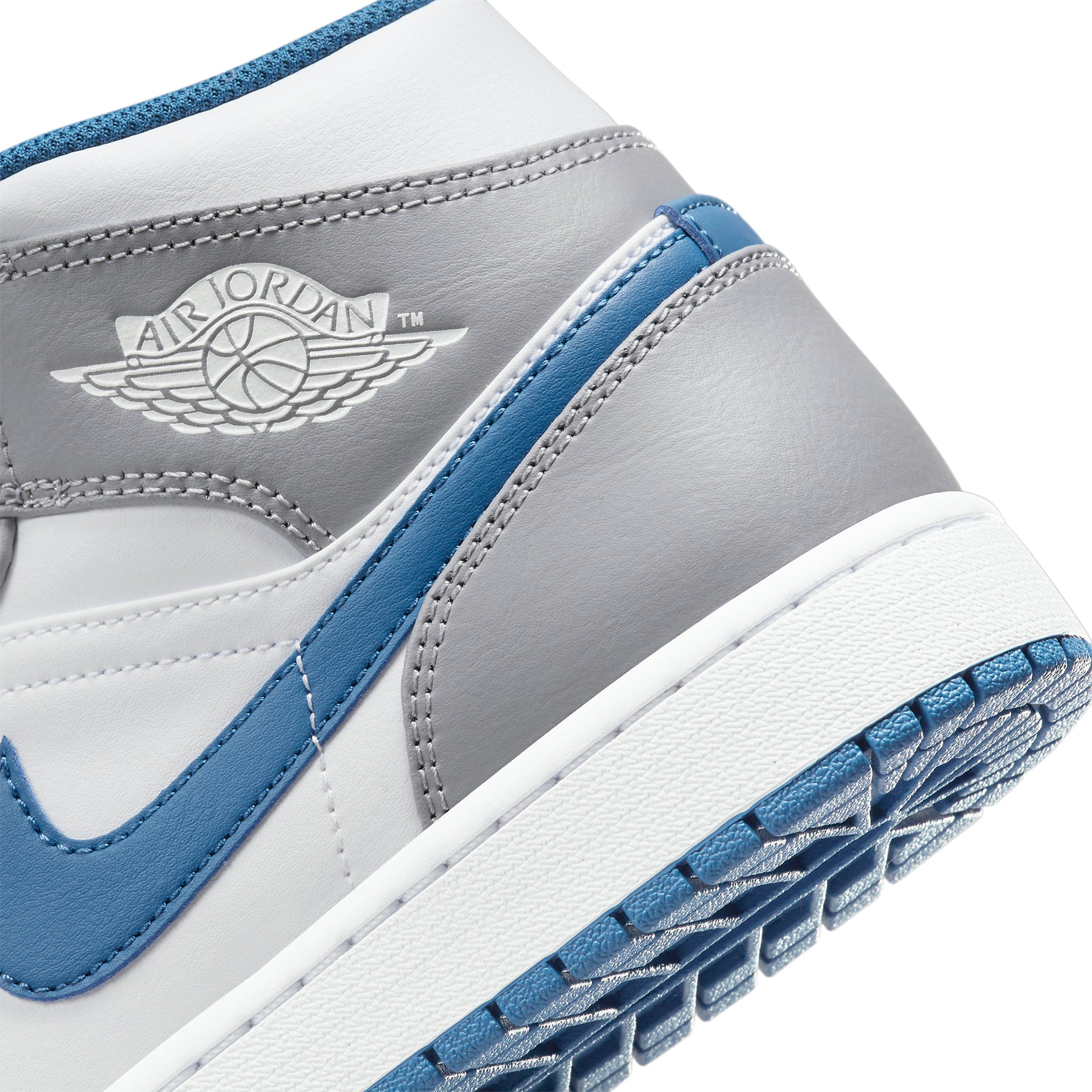 Air Jordan 1 Mid True Blue Cement - A highly sought-after sneaker option for sneakerheads.