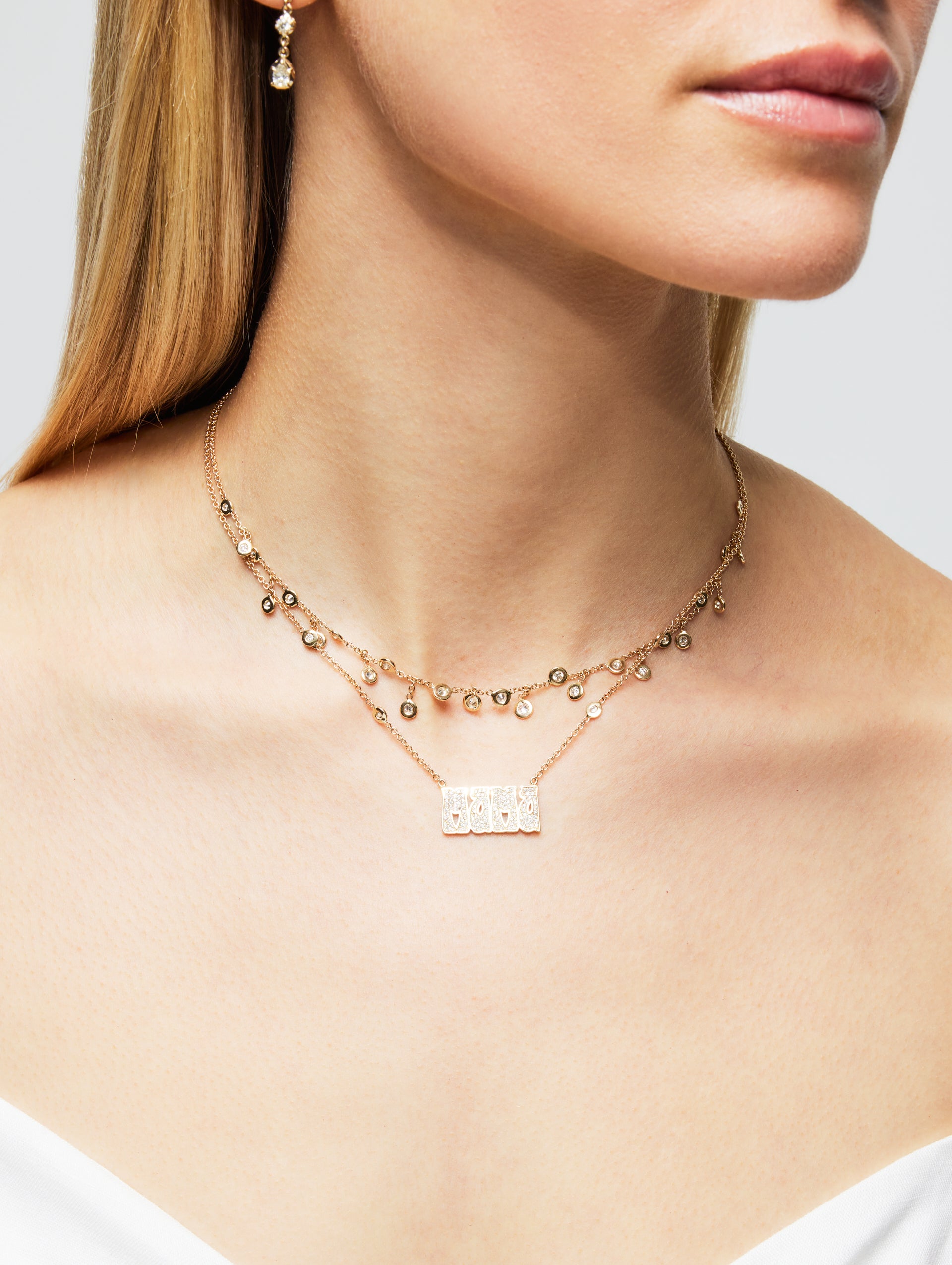 Diamond Shaker Necklace can be rewritten as Shimmering Diamond Pendant Necklace.