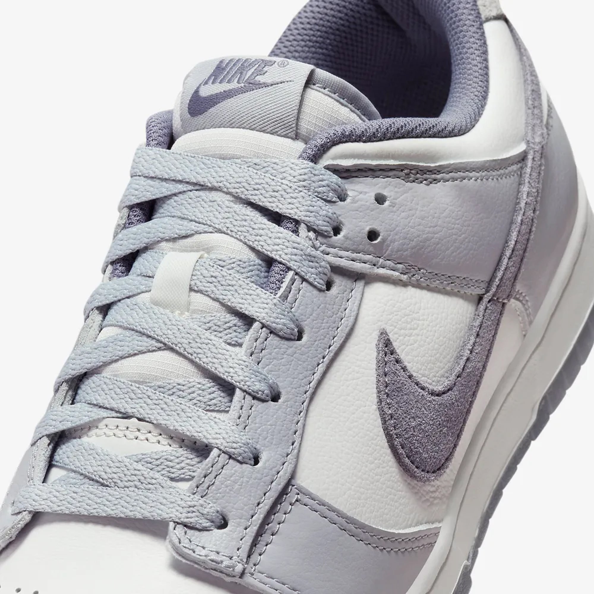 Dunk Low SE White Light Carbon Platinum Tint sneakers.