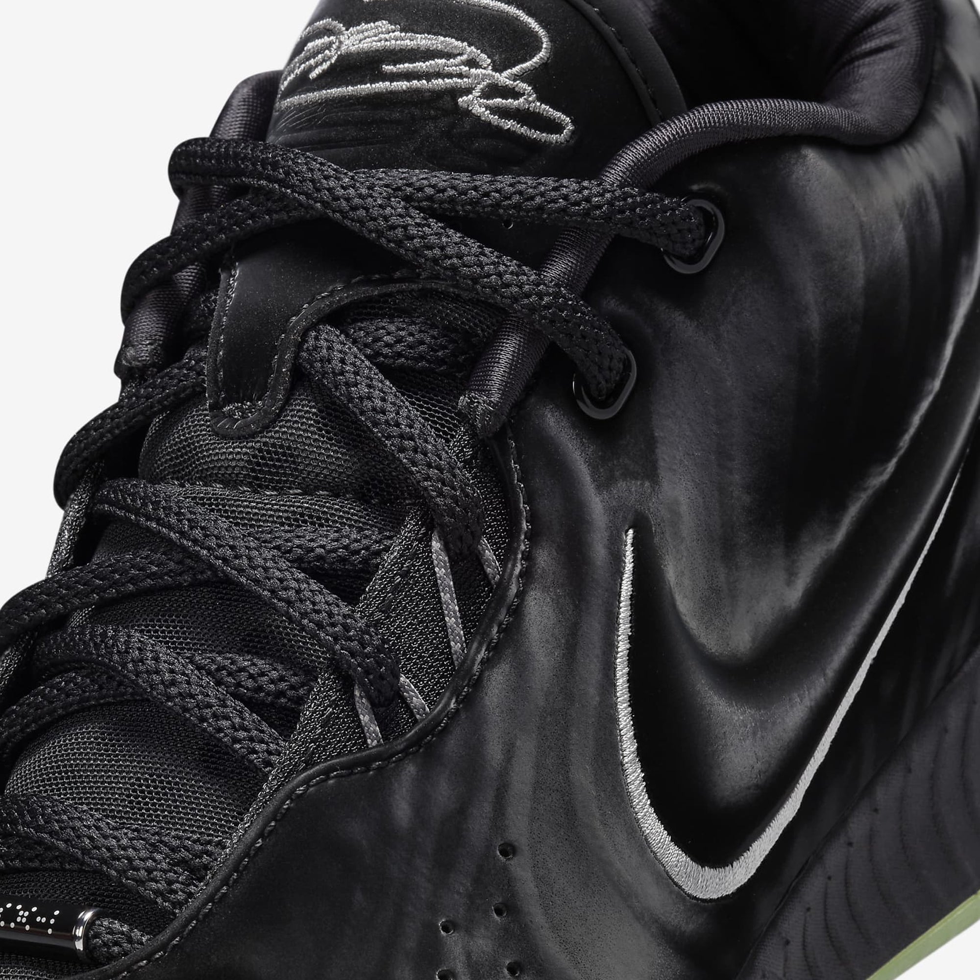 LEBRON 21 Tahitian EP sneakers in black, metallic pewter, iron grey, and oil green.