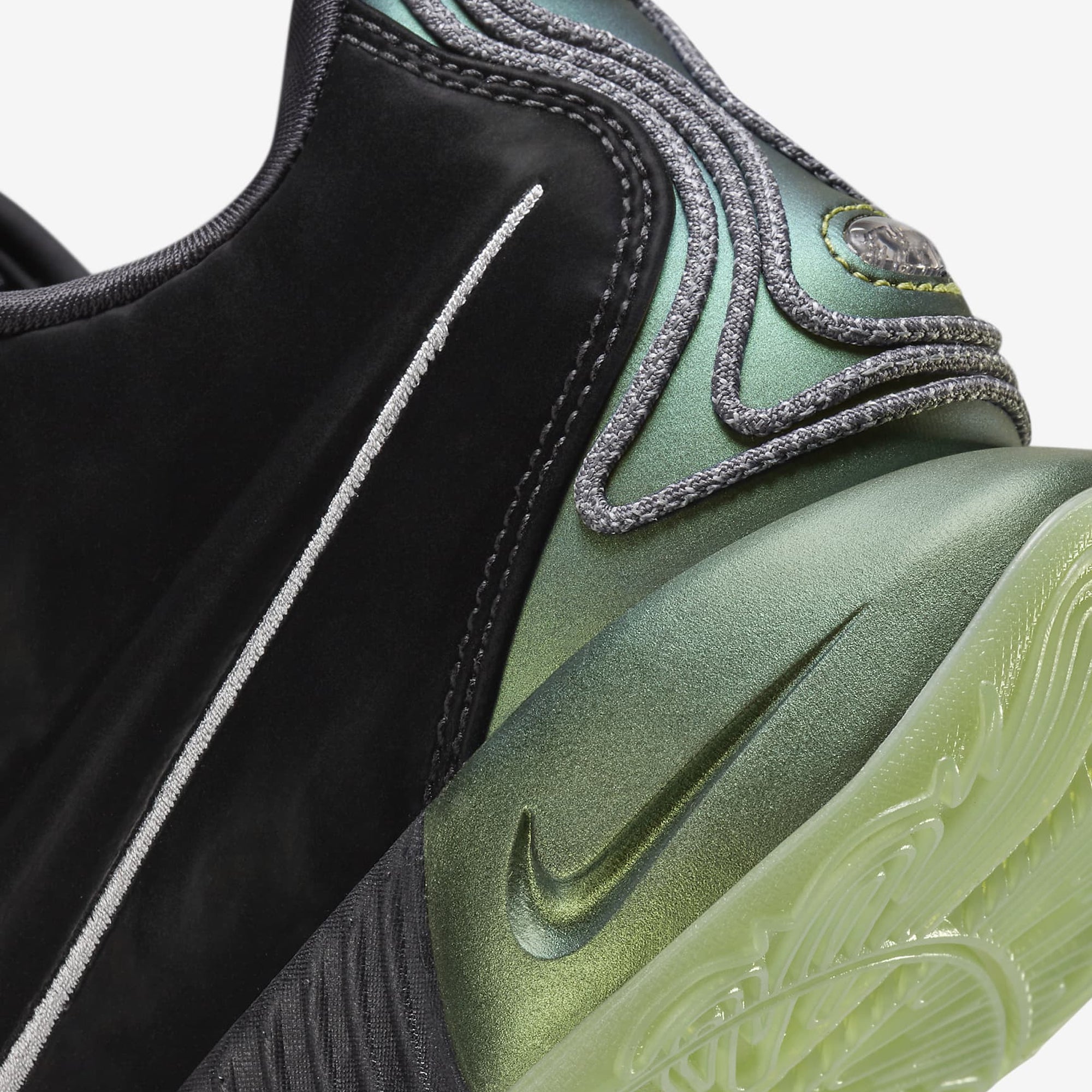 LEBRON 21 Tahitian EP sneakers in black, metallic pewter, iron grey, and oil green.