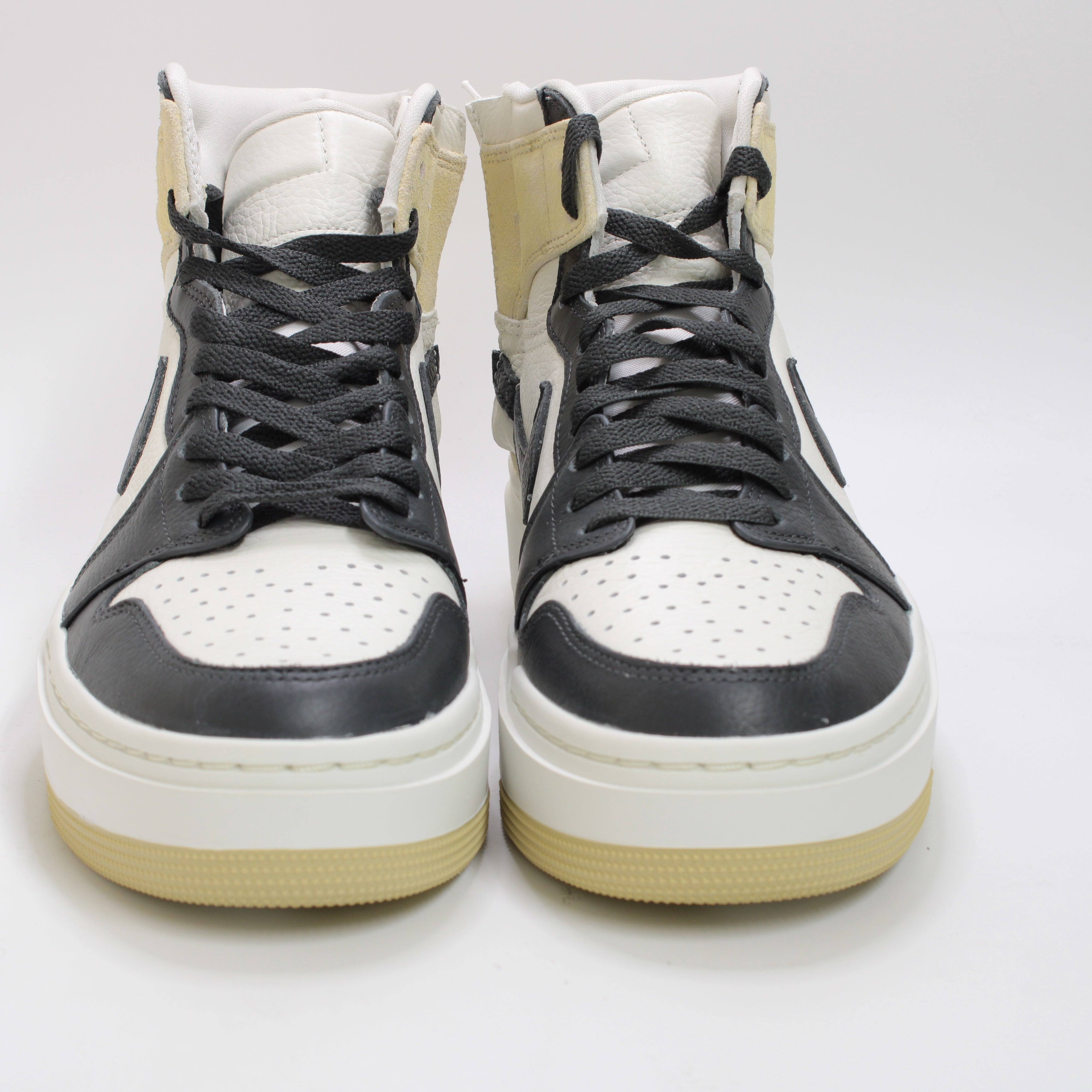 Nike Air Jordan 1 Elevate High Top Trainers in Team Gold, Dark Smoke Grey, and Sail.