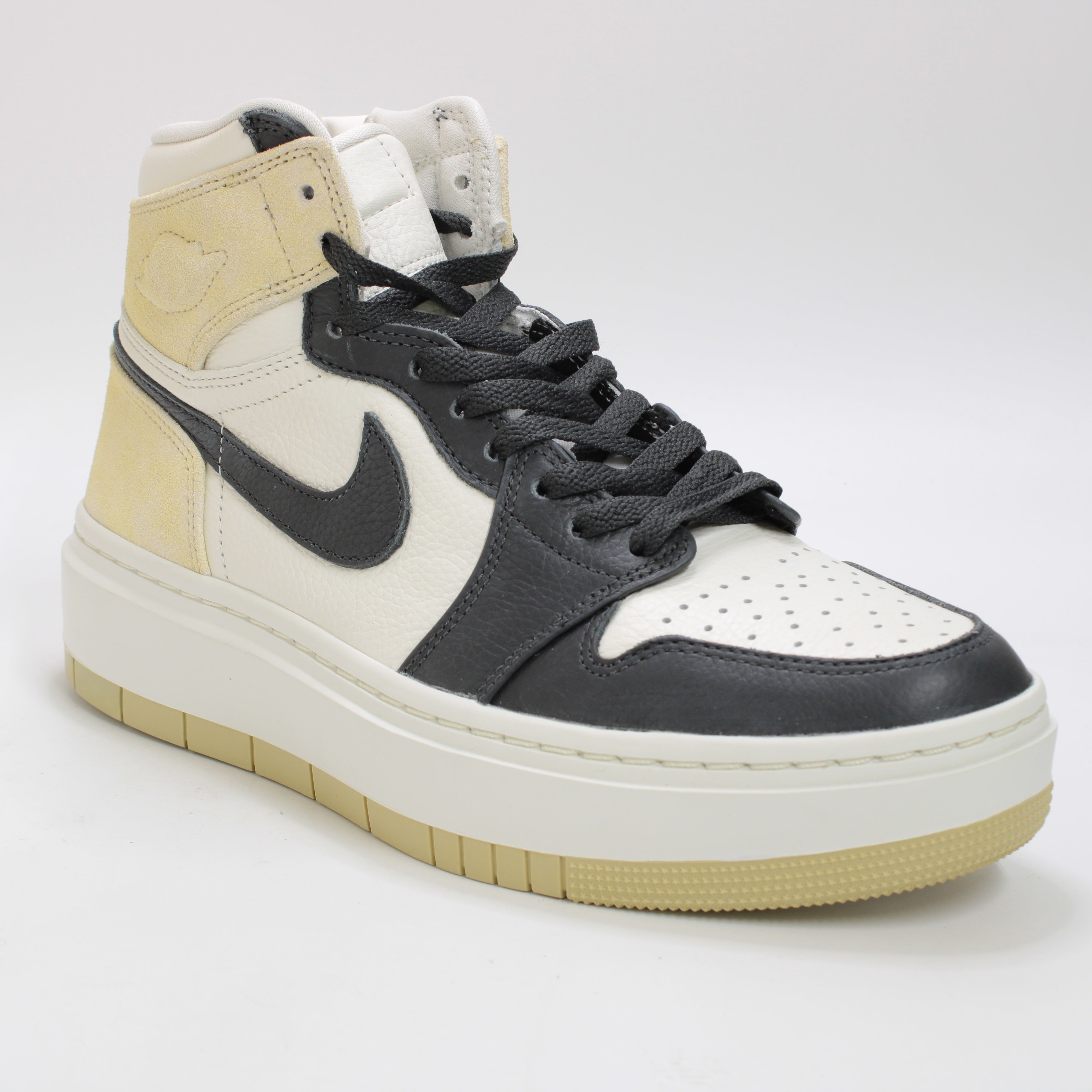 Nike Air Jordan 1 Elevate High Top Trainers in Team Gold, Dark Smoke Grey, and Sail.