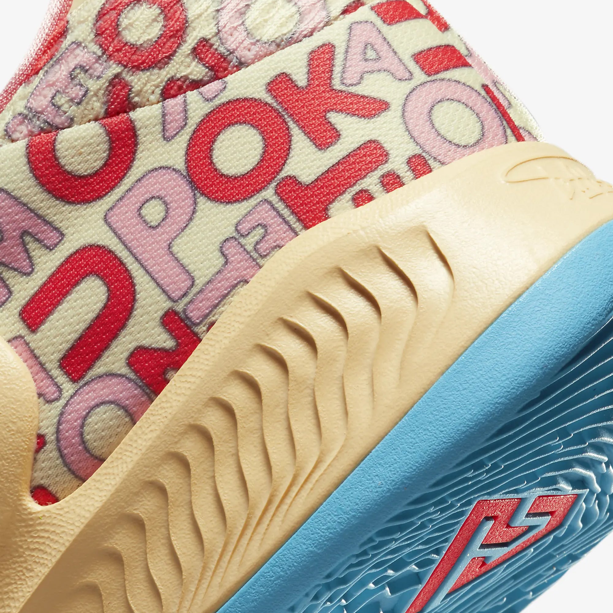 Nike ZOOM FREAK 4 sneakers in Pale Vanilla, Blue Lightning, and Coral Chalk.