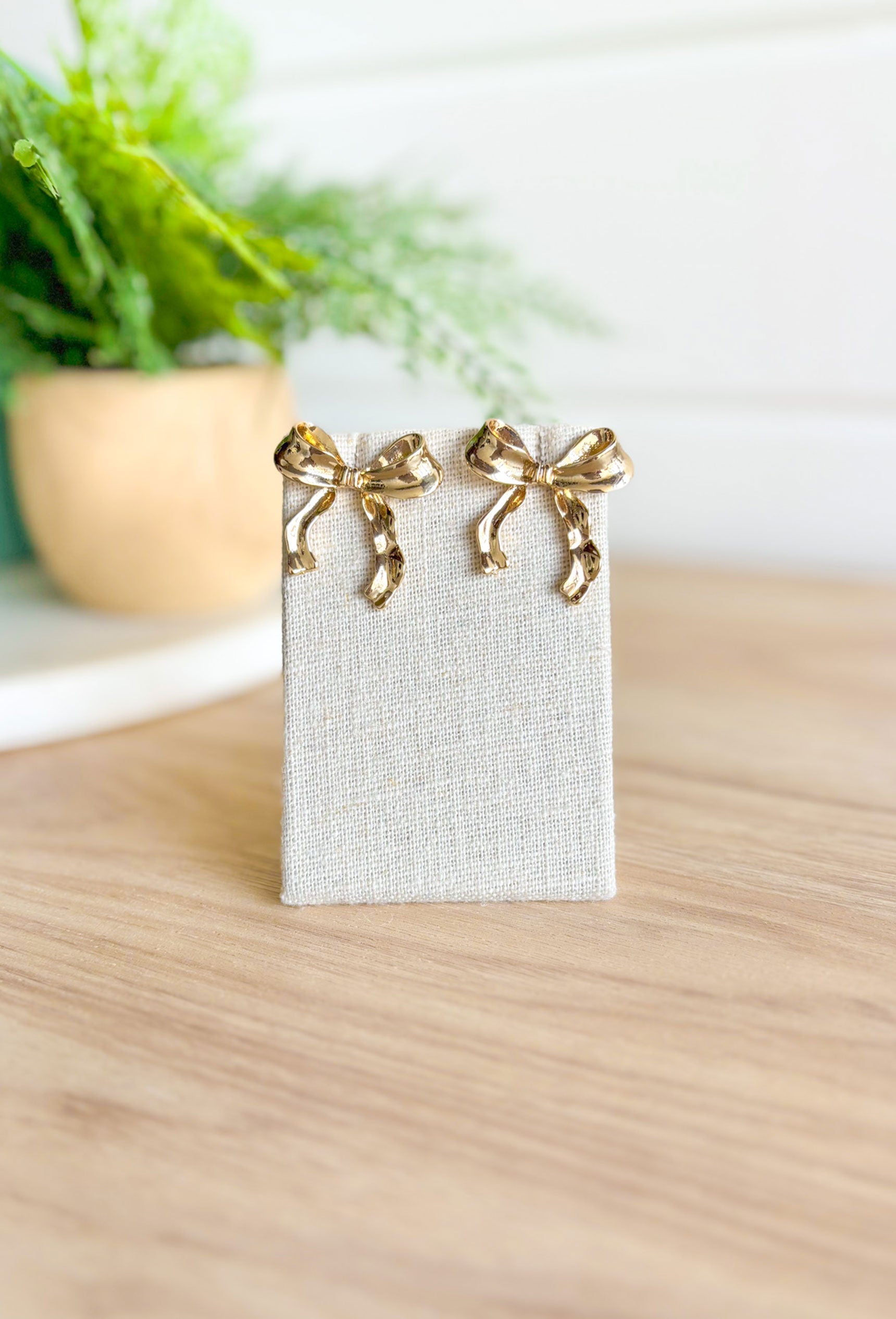 Paris Streets Bow Earrings - Trendy and stylish bow earrings inspired by the streets of Paris. Shop now for unique and fashionab