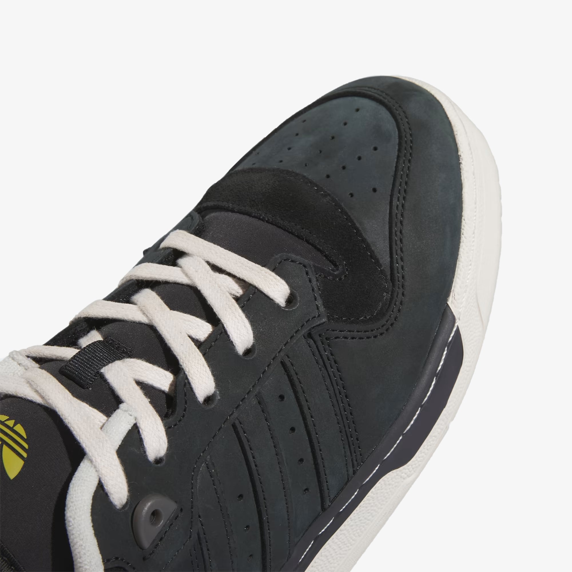 Rivalry 86 Low 003 in Core Black, Talc, and Olive