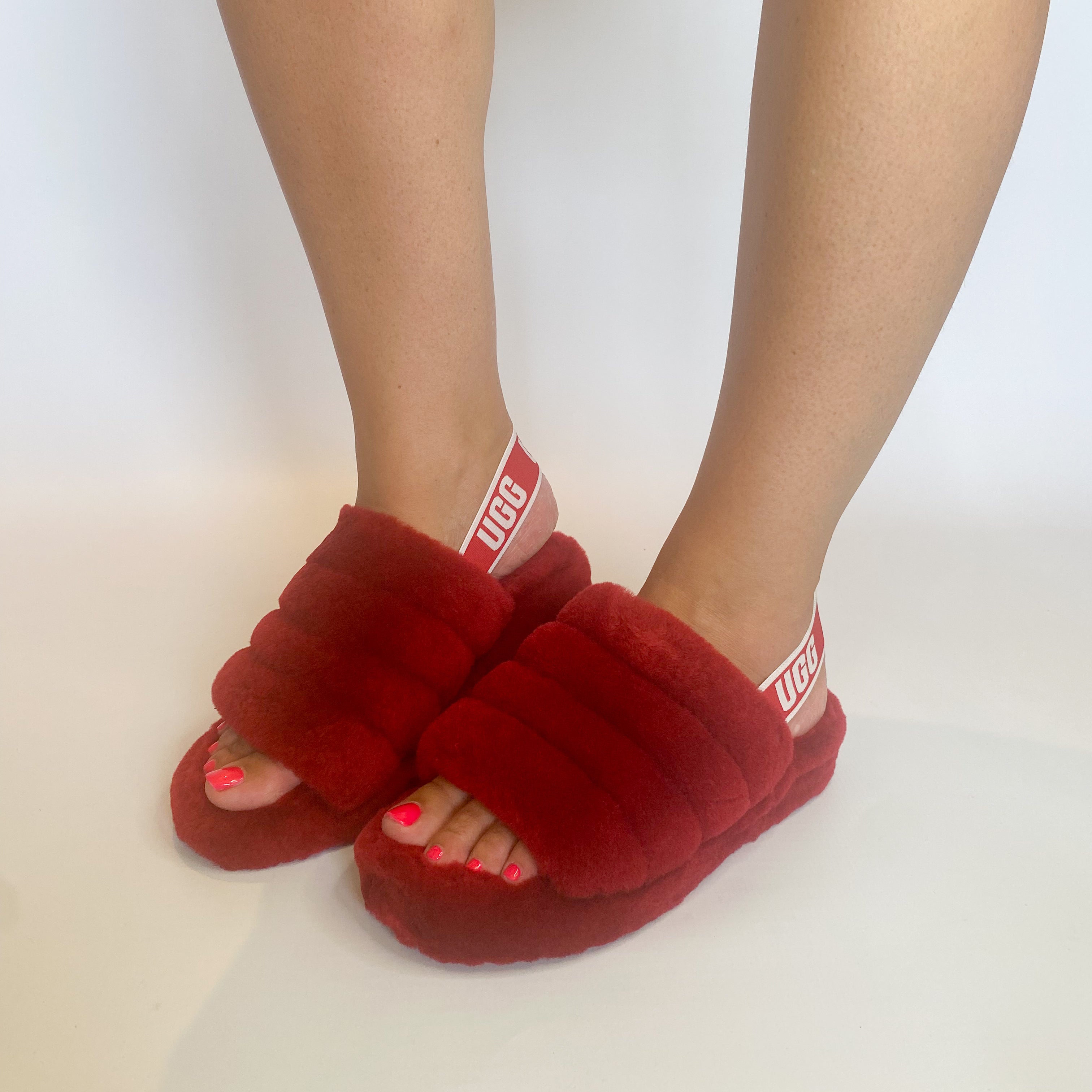 UGG red fluffy slide.