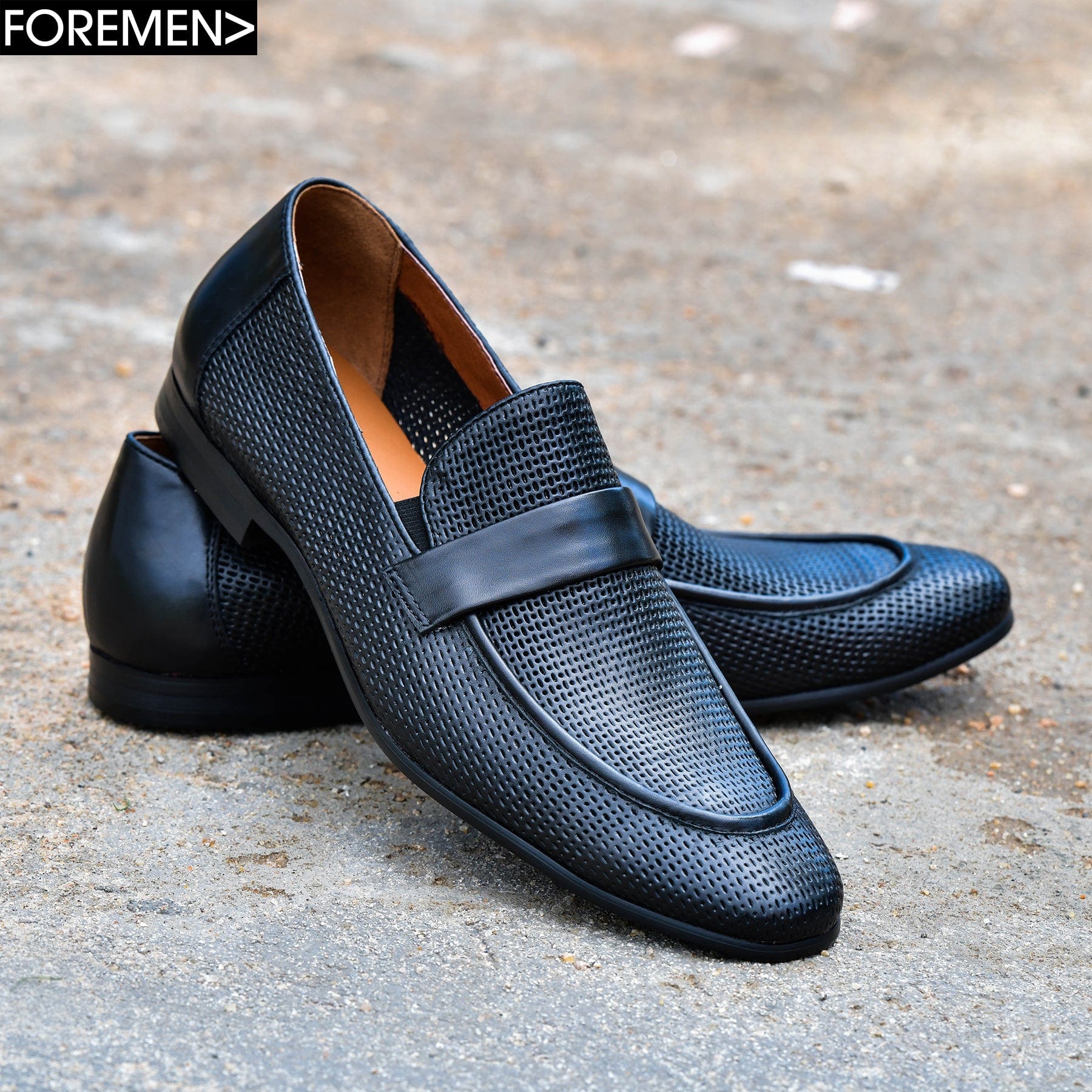 Valkan black perforated leather loafers for sale.