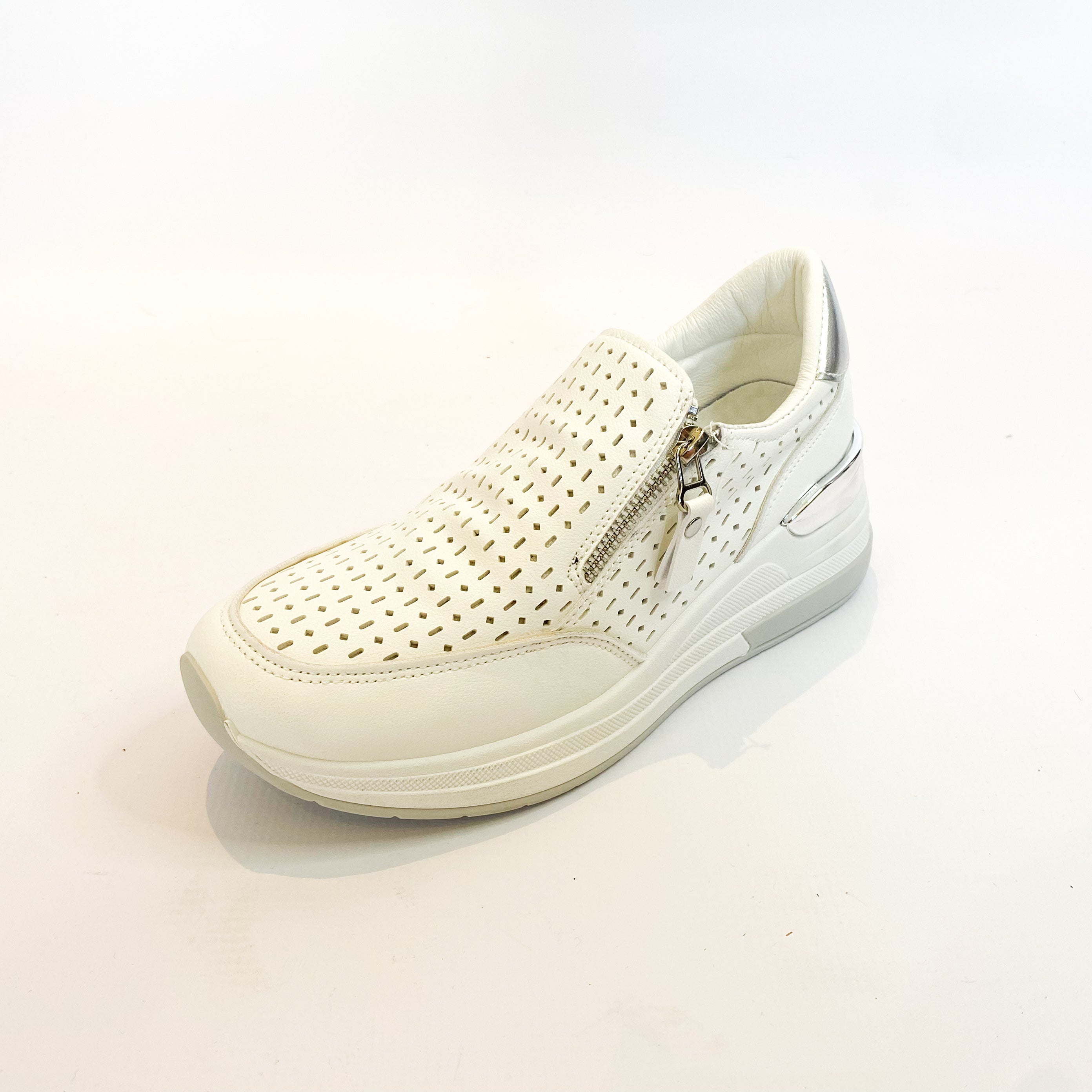 White platform zip slip-on shoes.