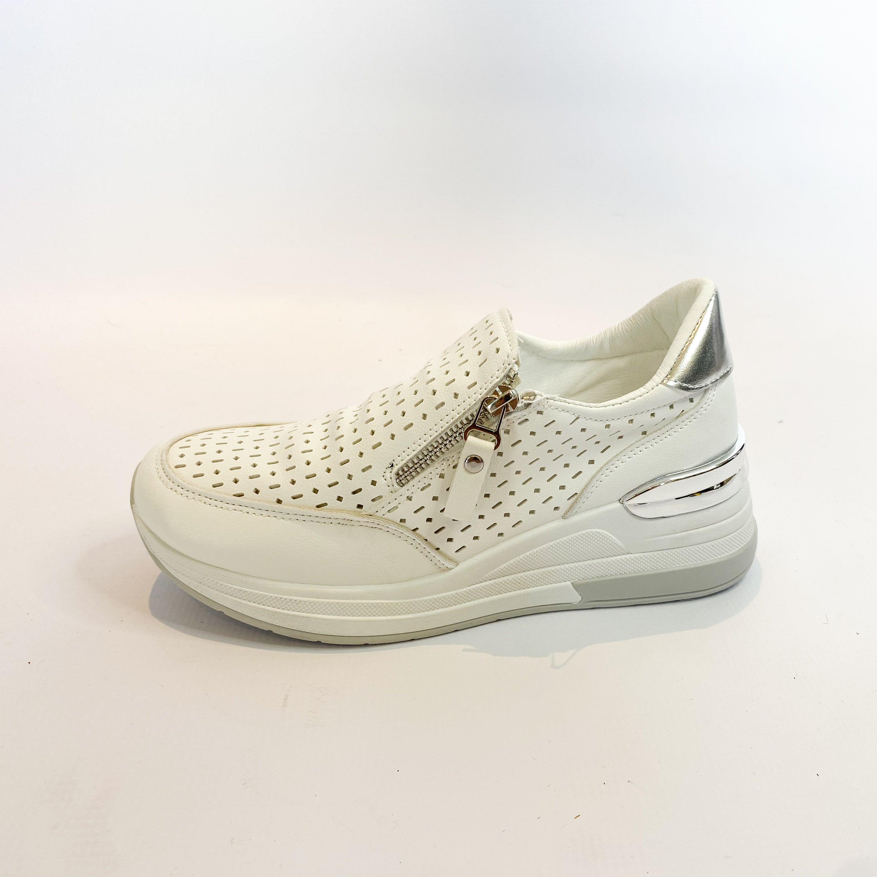 White platform zip slip-on shoes.