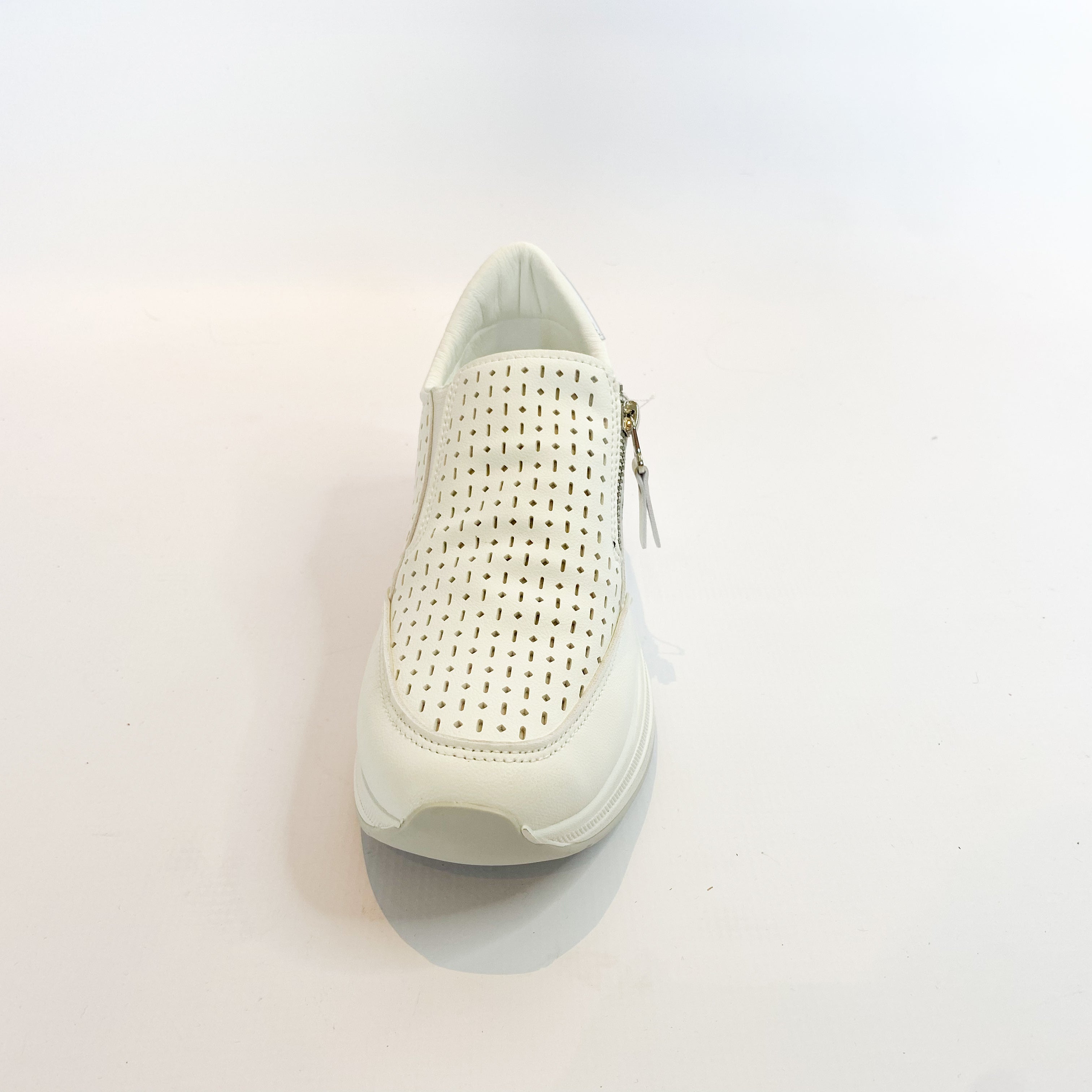 White platform zip slip-on shoes.