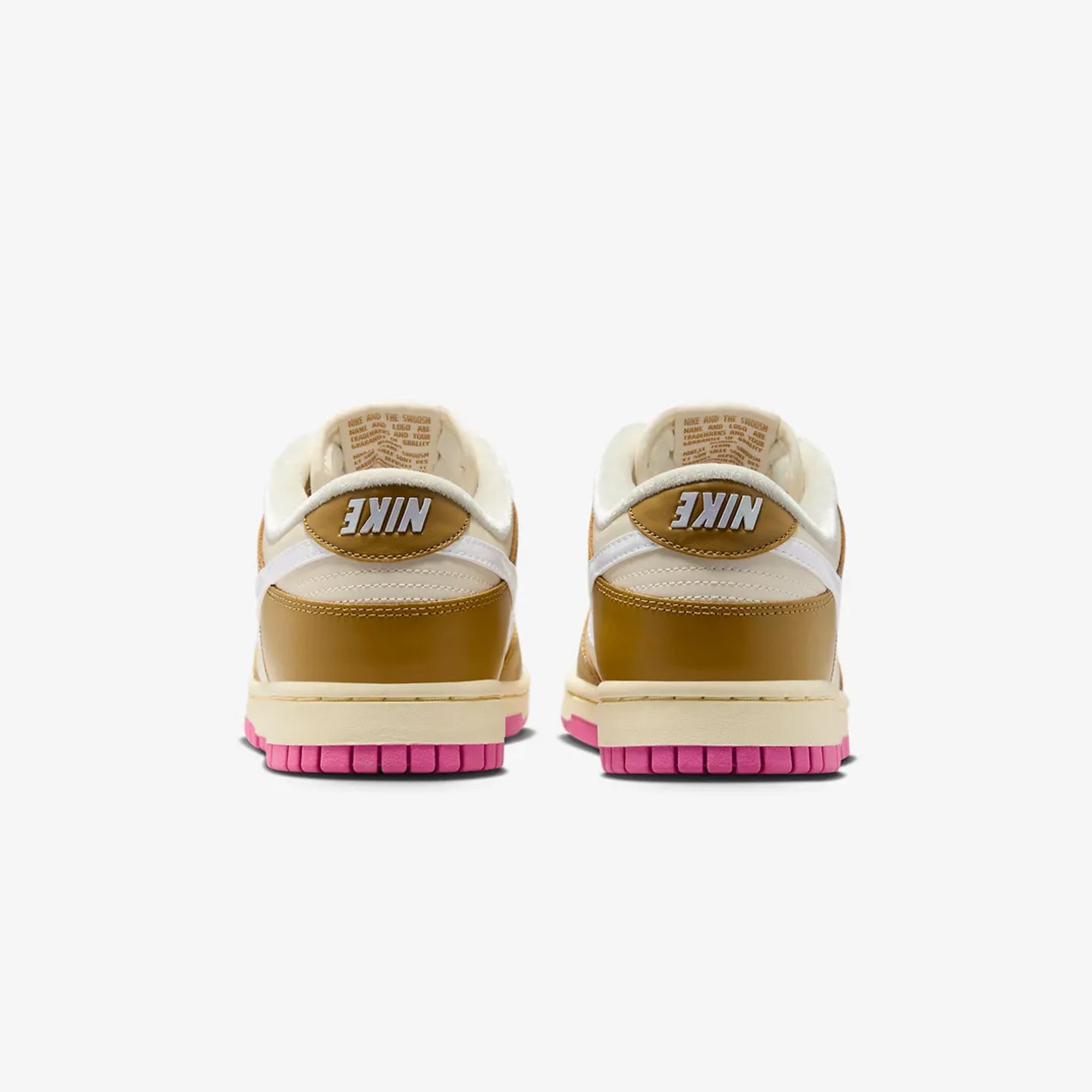 WMN'S Dunk Low SE Sneakers - Bronzine, Coconut Milk, Playful Pink | Shop Now